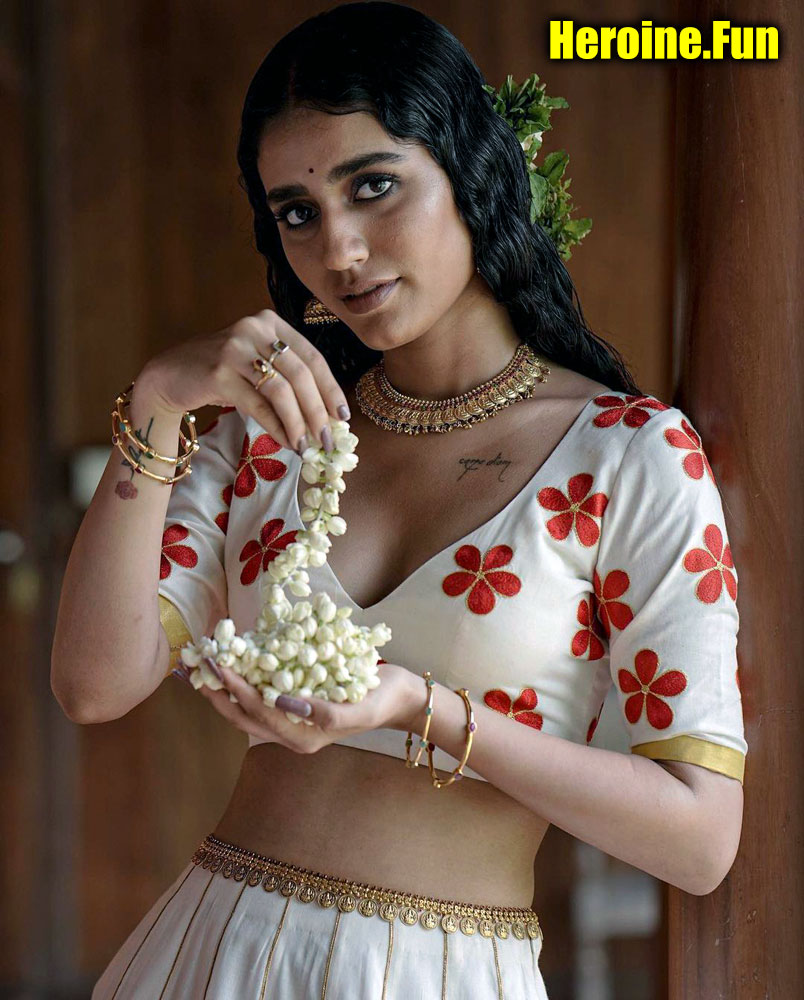 Priya Prakash Varrier low neck blouse sexy slim hip bold photoshoot